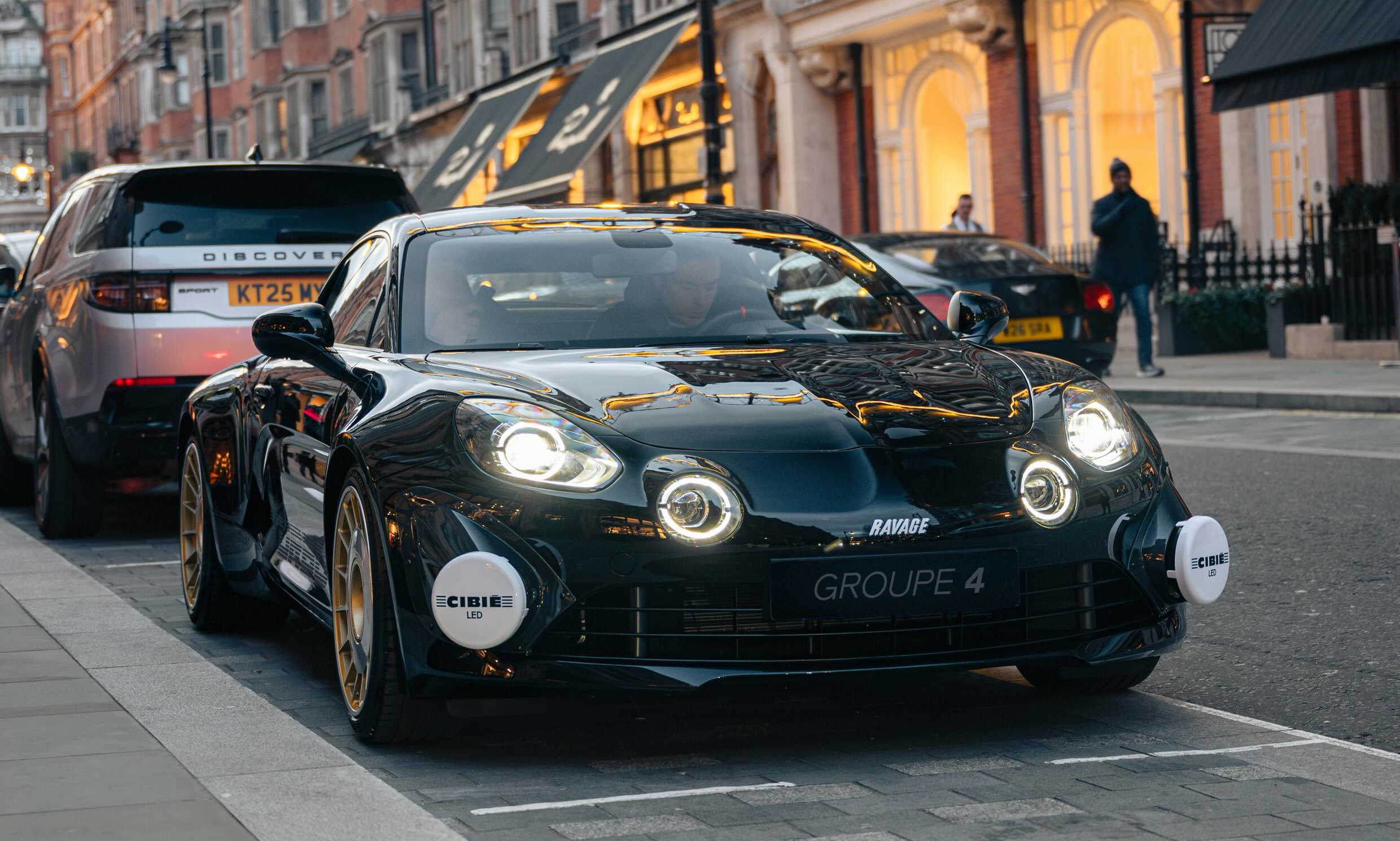 A RAVAGE GROUPE 4 in london - mount street -london mayfair -a black alpine A110 -sports car -restomod -singer